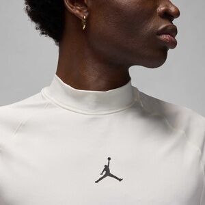 LIMITED EDITION “WE THE BEST” Jordan Dri-FIT Sport Golf Mock Neck T-Shirt White